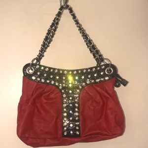 Absolutely beautiful red bag with black accents and sequence. Worn places shown.